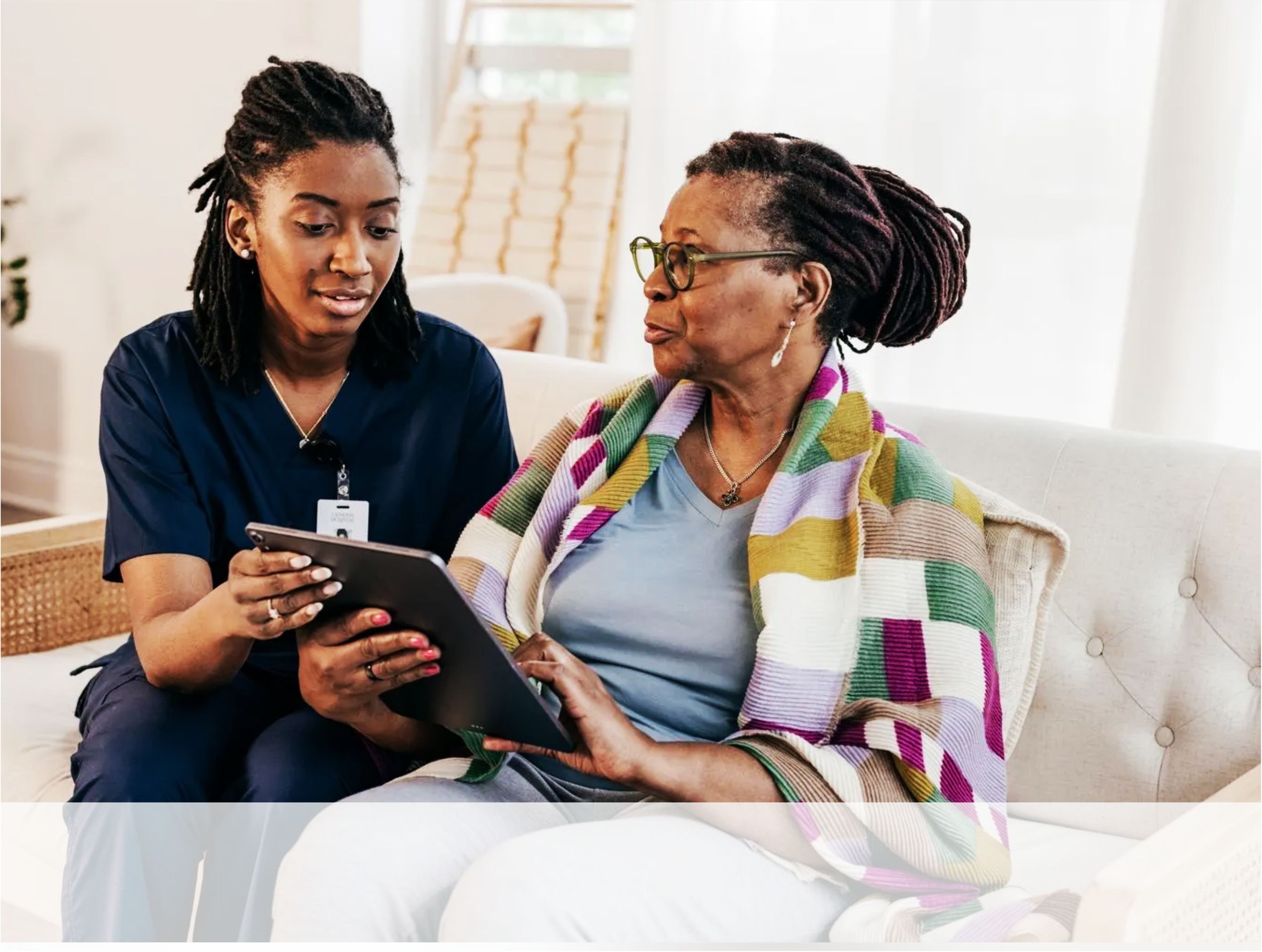 Caring Locals team connecting with client